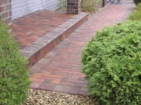 Bordered front entry and walkway