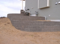 Three-level retaining wall