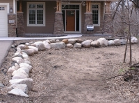 Boulders to create a subtle grade change